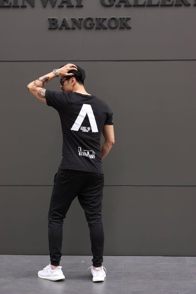 เสื้อยืดสีดำสกรีนลายเต็มแผ่นหลัง